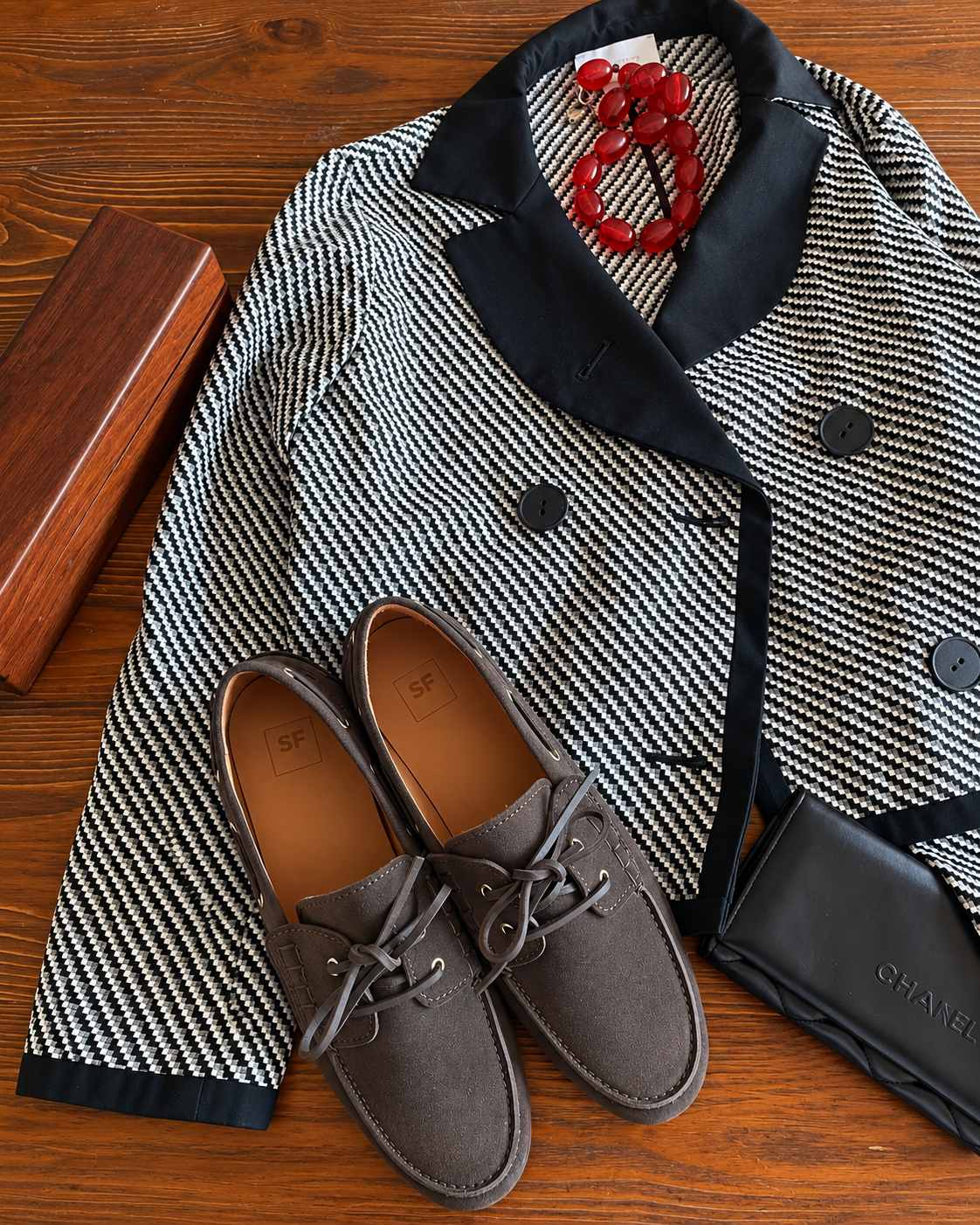 Riva Dark Brown Suede with a black and white jacket